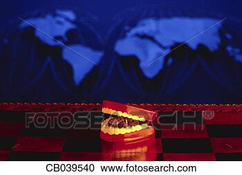 Stock Photography - chatter teeth 
on checker board. 
fotosearch - search 
stock photos, 
pictures, images, 
and photo clipart
