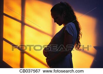 Picture - pregnant teen 
in shadows. fotosearch 
- search stock 
photos, pictures, 
images, and photo 
clipart