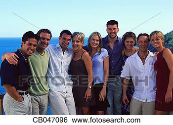 Stock Photo - friends standing 
together. fotosearch 
- search stock 
photos, pictures, 
images, and photo 
clipart