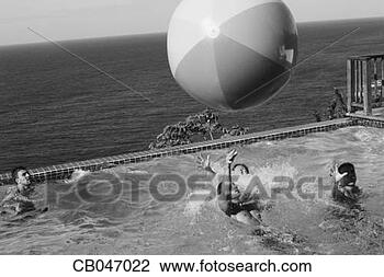 Stock Photo - swimmers tossing 
a beach ball. 
fotosearch - search 
stock photos, 
pictures, images, 
and photo clipart