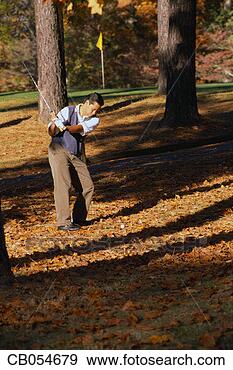 Stock Photograph - golfer in the 
rough. fotosearch 
- search stock 
photos, pictures, 
images, and photo 
clipart