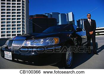 Stock Photo - chauffeur waiting  by limo. fotosearch  - search stock  photos, pictures,  images, and photo  clipart