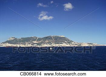 Stock Photo - boat sailing near 
rock of gibraltar. 
fotosearch - search 
stock photos, 
pictures, images, 
and photo clipart