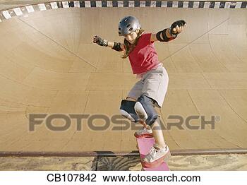 Stock Photo - pre-teen girl 
skateboarding. 
fotosearch - search 
stock photos, 
pictures, images, 
and photo clipart