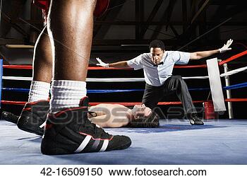 boxing-referee-calling_~42-16509150.jpg