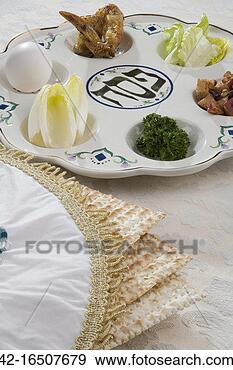 Stock Photograph - seder plate and 
matzoh bread. 
fotosearch - search 
stock photos, 
pictures, images, 
and photo clipart