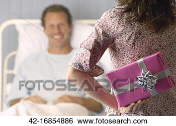 Stock Photo - visiting a patient 
in the hospital. 
fotosearch - search 
stock photos, 
pictures, images, 
and photo clipart