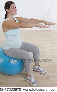 Stock Photography - pregnant woman 
exercising. fotosearch 
- search stock 
photos, pictures, 
images, and photo 
clipart
