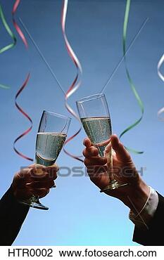 Stock Photo - champagne toast 
on new year`s 
eve. fotosearch 
- search stock 
photos, pictures, 
wall murals, images, 
and photo clipart