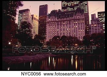 Stock Photo - city lights reflect 
in a central park 
pond at night. 
fotosearch - search 
stock photos, 
pictures, images, 
and photo clipart