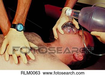 Stock Photo - paramedics giving 
cpr. fotosearch 
- search stock 
photos, pictures, 
images, and photo 
clipart