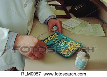 Picture - pharmacist filling 
medical prescription. 
fotosearch - search 
stock photos, 
pictures, images, 
and photo clipart