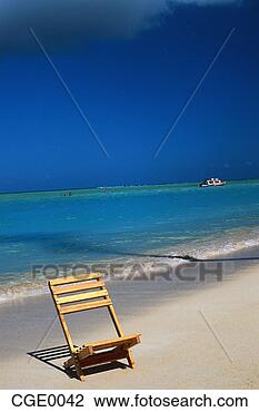 Stock Photo - beach chairs on 
a sandy beach. 
fotosearch - search 
stock photos, 
pictures, images, 
and photo clipart