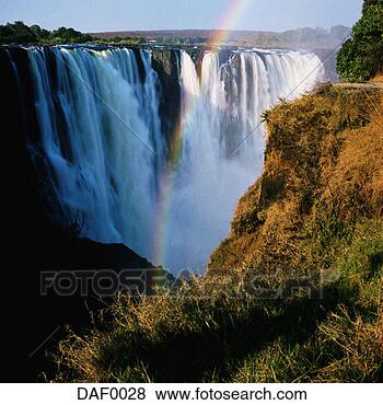 Stock Photo - rainbow and main 
falls at victoria 
falls. fotosearch 
- search stock 
photos, pictures, 
images, and photo 
clipart
