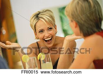 Stock Image - laughing woman 
holding up hands. 
fotosearch - search 
stock photos, 
pictures, images, 
and photo clipart