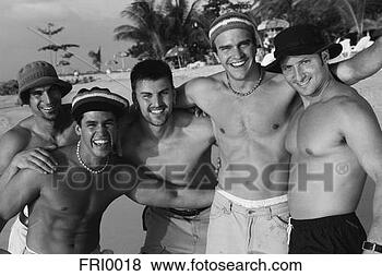 Stock Photo - men posing at 
beach. fotosearch 
- search stock 
photos, pictures, 
images, and photo 
clipart