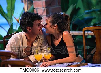 Stock Photo - couple kissing 
and having cocktails. 
fotosearch - search 
stock photos, 
pictures, images, 
and photo clipart
