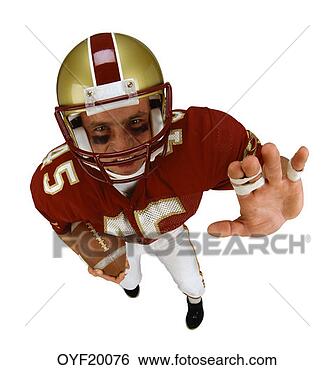 Stock Photo - football player 
approaching. fotosearch 
- search stock 
photos, pictures, 
images, and photo 
clipart