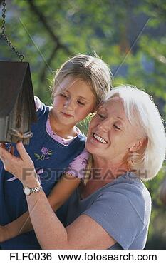 Stock Photo - birdhouses,  granddaughters, 
 grandmothers, 
 childhood,  curiosity. 
fotosearch - search 
stock photos, 
pictures, images, 
and photo clipart