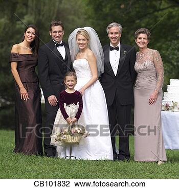 Stock Photo - smiling family 
in wedding portrait. 
fotosearch - search 
stock photos, 
pictures, images, 
and photo clipart