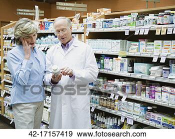 Stock Photograph - health food store 
pharmacist assisting 
customer. fotosearch 
- search stock 
photos, pictures, 
images, and photo 
clipart