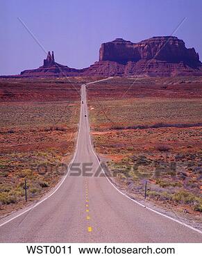 Stock Photography - highway and natural 
monuments in monument 
valley. fotosearch 
- search stock 
photos, pictures, 
images, and photo 
clipart