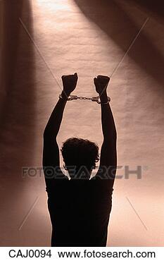 Stock Photo - prisoner raising 
shackled fists. 
fotosearch - search 
stock photos, 
pictures, wall 
murals, images, 
and photo clipart