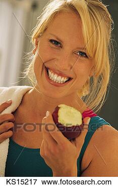 Picture - women: beauty, 
apple, beauty, 
exercising, fitness, 
fruit. fotosearch 
- search stock 
photos, pictures, 
images, and photo 
clipart