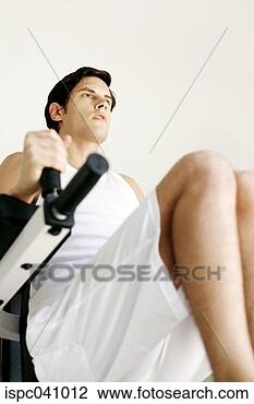 Stock Photo - man working out 
in gym. fotosearch 
- search stock 
photos, pictures, 
images, and photo 
clipart