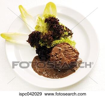 Stock Photograph - steak fillet with 
peppercorn sauce 
and rocket salad. 
fotosearch - search 
stock photos, 
pictures, images, 
and photo clipart