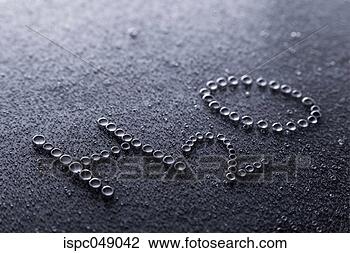 Stock Photo - water droplets 
making a h2o on 
a surface. fotosearch 
- search stock 
photos, pictures, 
images, and photo 
clipart