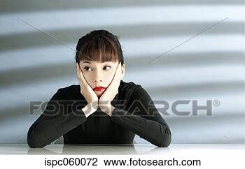 Stock Photo - woman holding 
her head. fotosearch 
- search stock 
photos, pictures, 
images, and photo 
clipart