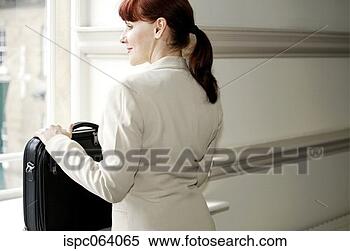 Stock Image - businesswoman 
with laptop bag. 
fotosearch - search 
stock photos, 
pictures, images, 
and photo clipart