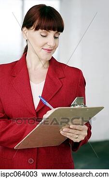 Stock Photo - businesswoman 
writing on clipboard. 
fotosearch - search 
stock photos, 
pictures, images, 
and photo clipart