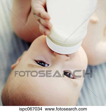 Stock Photo - baby drinking 
milk. fotosearch 
- search stock 
photos, pictures, 
images, and photo 
clipart