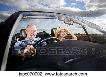Stock Photo - senior couple 
traveling in the 
car. fotosearch 
- search stock 
photos, pictures, 
images, and photo 
clipart