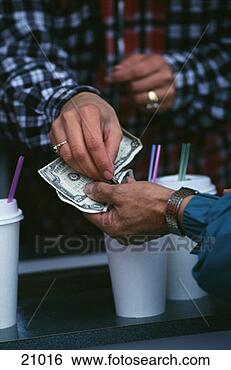 Stock Photo - paying for espresso 
drinks. fotosearch 
- search stock 
photos, pictures, 
images, and photo 
clipart
