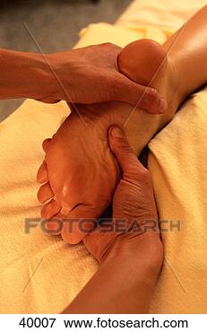 Picture - foot massage. 
fotosearch - search 
stock photos, 
pictures, images, 
and photo clipart