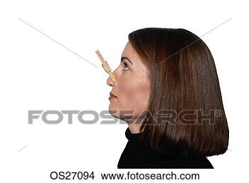 Stock Photo - woman with clothespin 
on her nose. fotosearch 
- search stock 
photos, pictures, 
images, and photo 
clipart