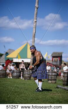 Picture - caber tossing. 
fotosearch - search 
stock photos, 
pictures, images, 
and photo clipart