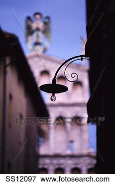 Picture - tuscany, italy 
- streetlight 
jutting out from 
build. fotosearch 
- search stock 
photos, pictures, 
images, and photo 
clipart