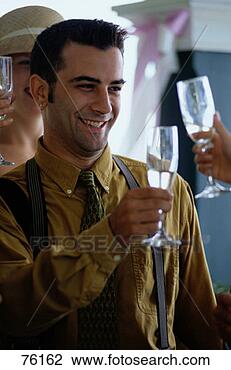Stock Photo - man toasting at 
a wedding. fotosearch 
- search stock 
photos, pictures, 
images, and photo 
clipart