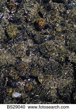 Stock Photography - rocks in a stream. 
fotosearch - search 
stock photos, 
pictures, images, 
and photo clipart