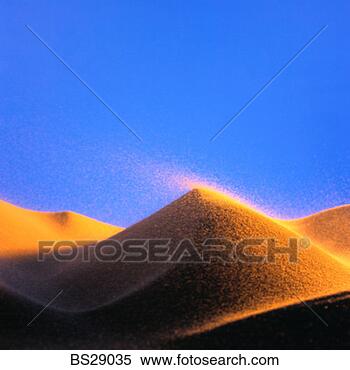 Stock Image - sand dunes in 
the wind. fotosearch 
- search stock 
photos, pictures, 
images, and photo 
clipart