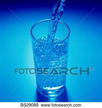 Stock Photograph - water being poured 
into a glass. 
fotosearch - search 
stock photos, 
pictures, images, 
and photo clipart