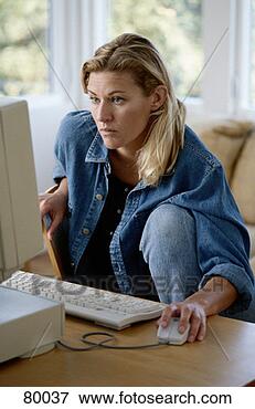 Picture - woman using a 
computer. fotosearch 
- search stock 
photos, pictures, 
images, and photo 
clipart
