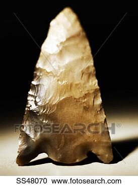 Stock Photography - flint arrow head. 
fotosearch - search 
stock photos, 
pictures, images, 
and photo clipart
