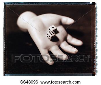 Stock Photo - hand holding dice. 
fotosearch - search 
stock photos, 
pictures, images, 
and photo clipart