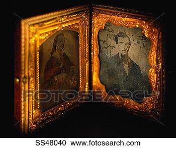 Stock Photography - old photographs 
in a picture frame. 
fotosearch - search 
stock photos, 
pictures, images, 
and photo clipart