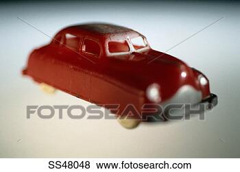 Stock Photo - red antique toy 
car. fotosearch 
- search stock 
photos, pictures, 
images, and photo 
clipart